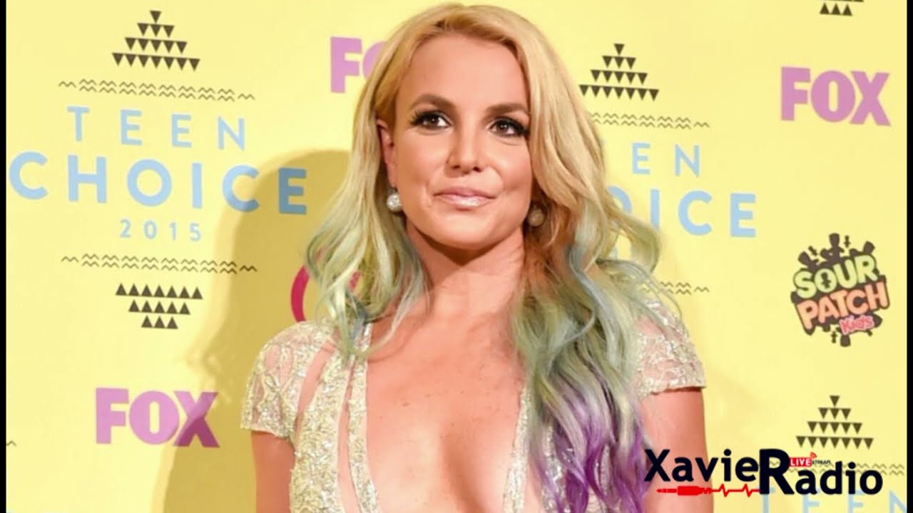Britney Spears Rolls Around On The Beach In A Drawstring Bikini