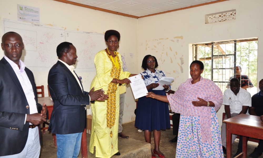Minister directs districts on registering government land, hands over more than 400 freehold titles in Kiruhura - UG Standard