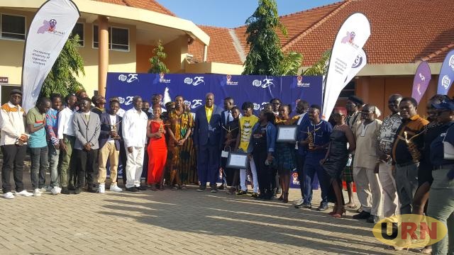 Winners of the short film competition , Karamoja leaders and UCC officials in a group photo during award ceremony at Hotel Africana in Moroto district.