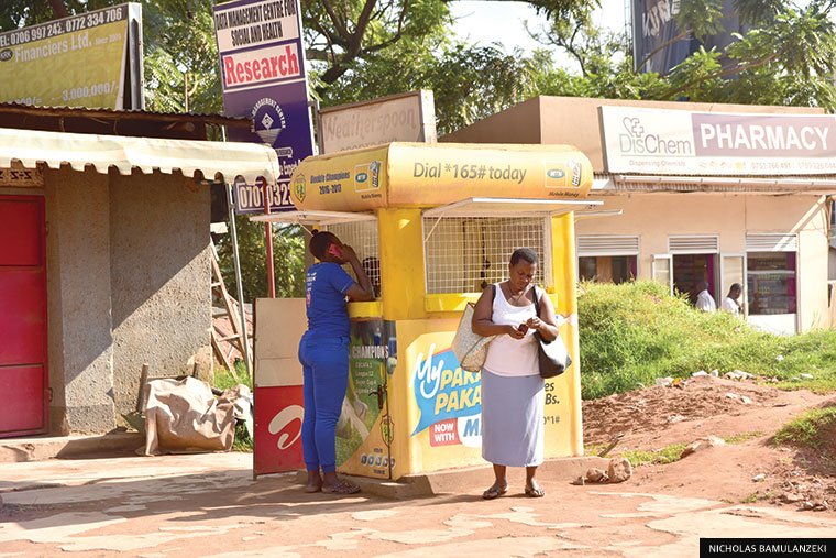 BoU explains new rule for customers sending, withdrawing shs1m on mobile money to present national IDs
