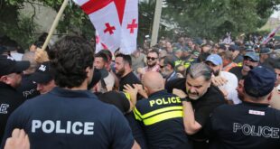 Anti-LGBTQ+ activists clash with police as they try to interfere with a gathering of the LGBTQ+ community for the Tbilisi Pride Festival in Tbilisi in July 2023. (Photo courtesy of AFP via Getty Images)