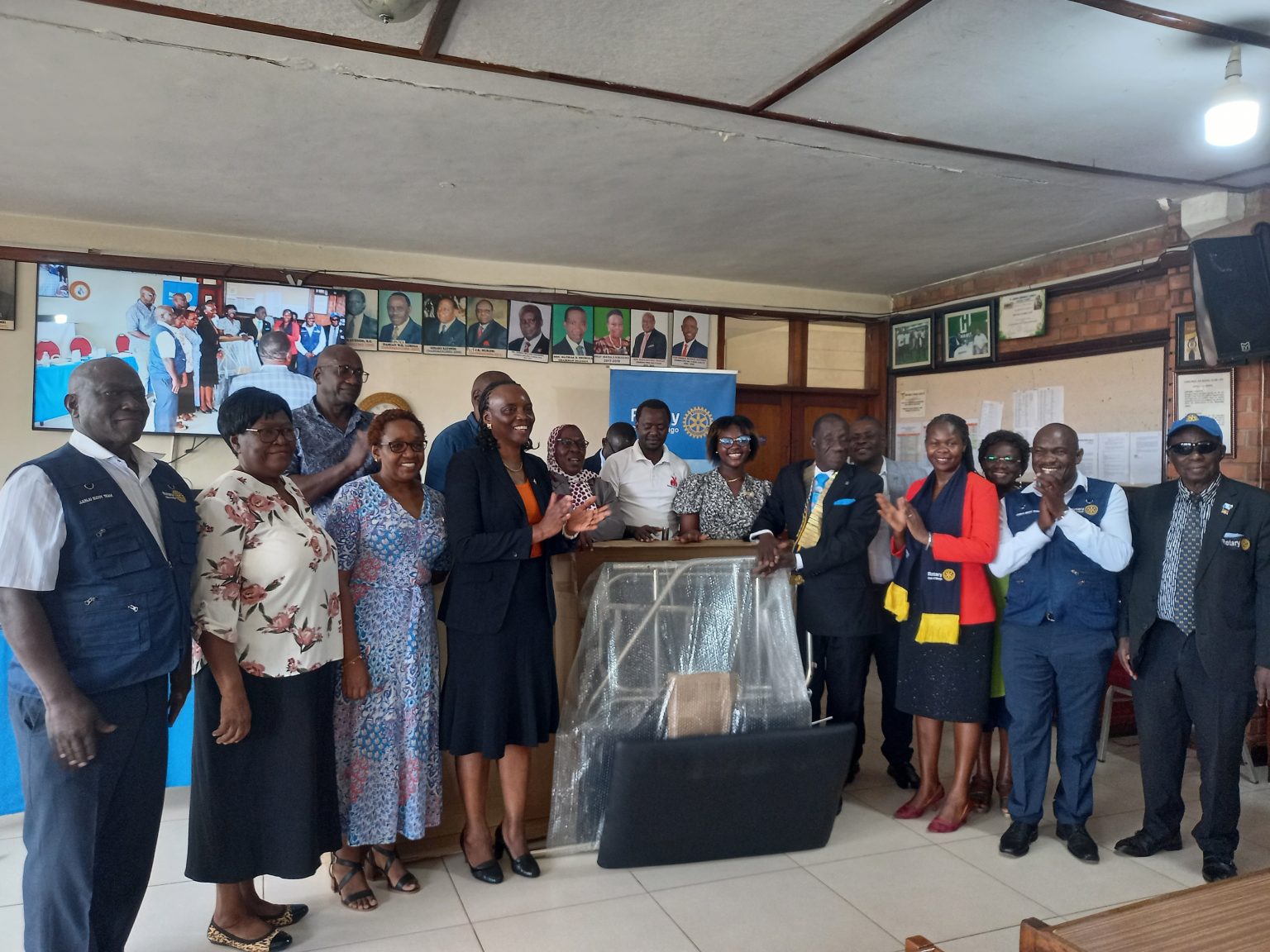 Rotary Club of Mengo Receives Maternal Bed Donation from District