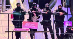 Russian police raid ‘kissing party‘ 1 The Kissing Club posted this photo, which apparently shows Moscow police scrutinizing guests at the party.