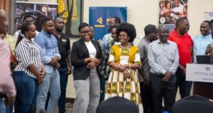 The delgates shared a light moment after the dedication prayers led by Pr. Deogratius Musoke