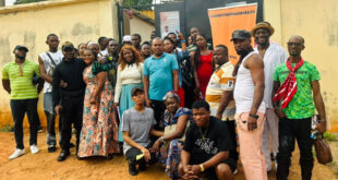 Participants pose for a photo at the Legal Cafe that's a regular monthly event.