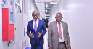 Equity Banks Managing Director Claver Serumaga tours the Raxio Data Centre with David Kalyango, Excutive Director Bank Supervision Bank of Uganda