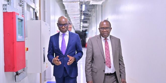 Equity Banks Managing Director Claver Serumaga tours the Raxio Data Centre with David Kalyango, Excutive Director Bank Supervision Bank of Uganda