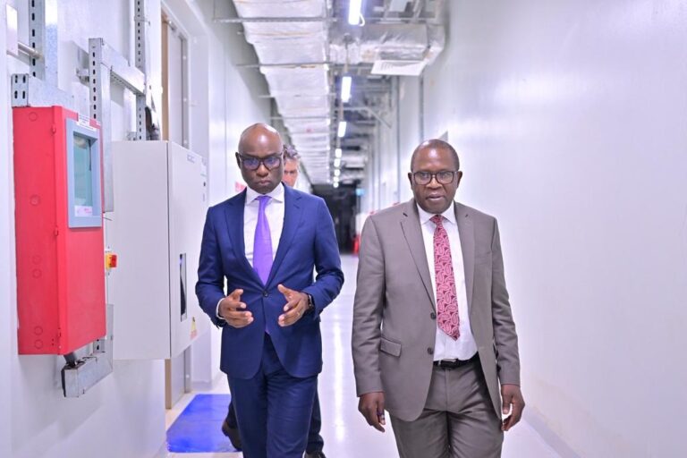 Equity Banks Managing Director Claver Serumaga tours the Raxio Data Centre with David Kalyango, Excutive Director Bank Supervision Bank of Uganda