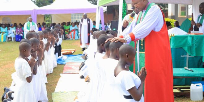 Bishop Kagodo Confirms 60 Christians at Buziika Urges Parents to