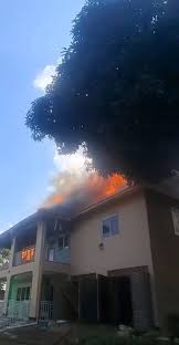 SHEEMA POLICE RESCUE WOMAN IN HOUSE FIRE